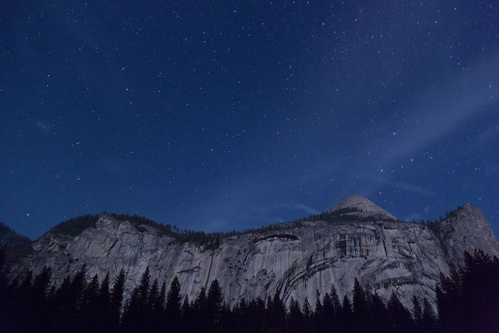 Night sky over a mountain ridge